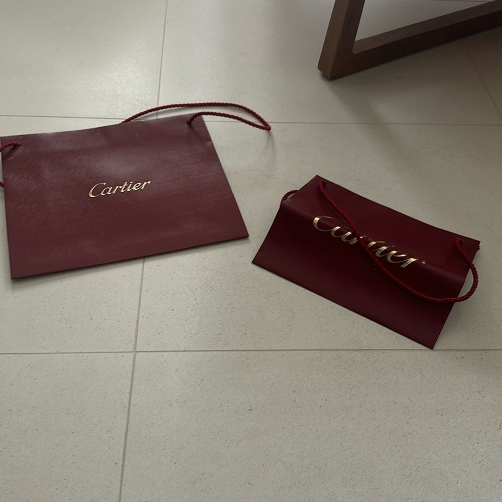 100 percent authentic. Set of 2 Cartier bags.